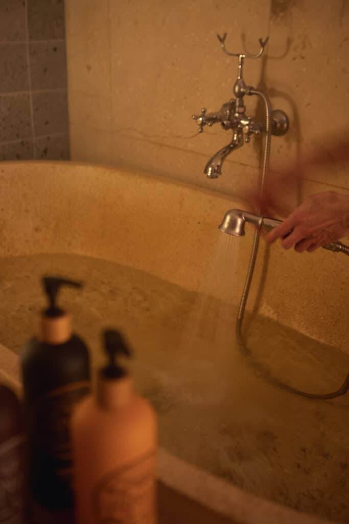 Spa bathtub with I Love Eco Essentials products at Oslo Guldsmeden Hotel